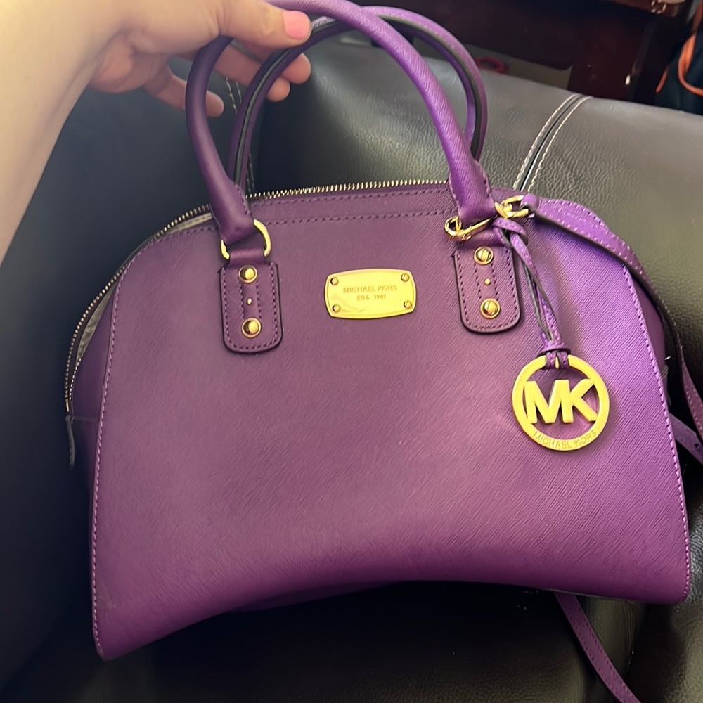 authentic Michael Kors handbag with a crossbody option. Mint condition.